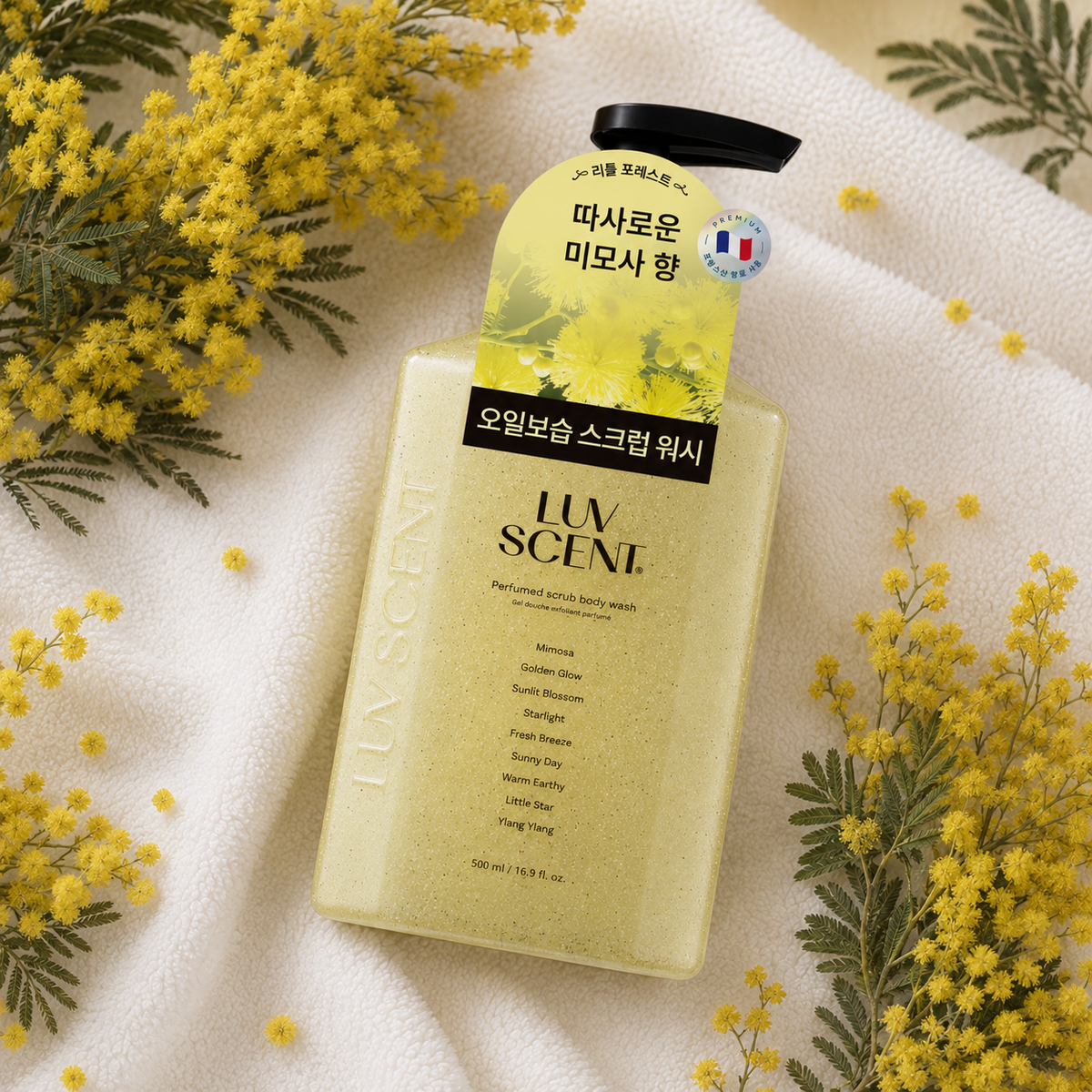 A bottle of LUV SCENT Little Forest Mimosa Perfumed Scrub Wash 500ML, for the best immersive floral sensory shower experience.
